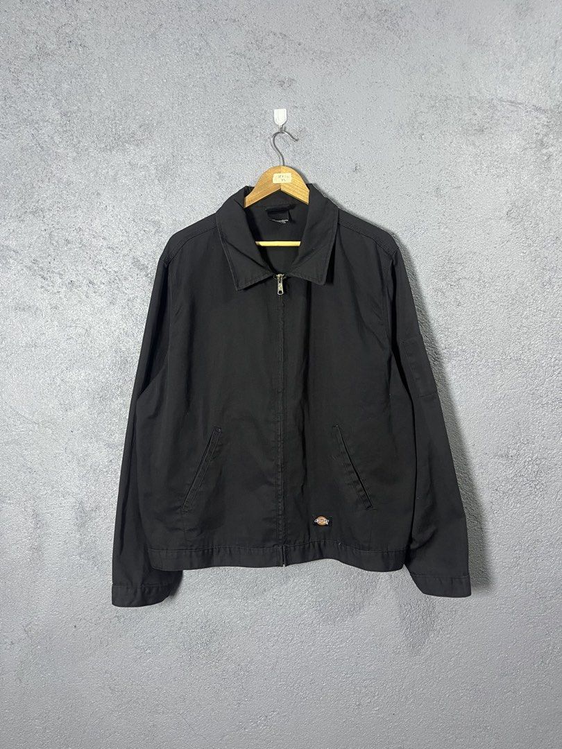 Dickies Black Zip-Up Jacket XL (Category: Coats, Jackets and Outerwear) located in Famy. Submitted by basicthrifted (Listing ID 1454953966, Image 1). Description: - Classic black Dickies jacket - Zip-up front with collar - Two side pockets - Button cuffs on sleeves - Durable workwear style - Perfect for layering - Size XL.