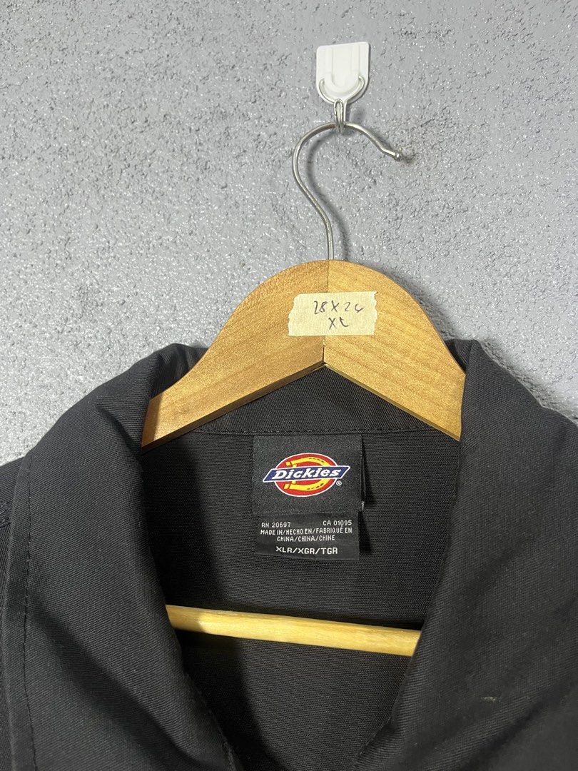 Dickies Black Zip-Up Jacket XL (Category: Coats, Jackets and Outerwear) located in Famy. Submitted by basicthrifted (Listing ID 1454953966, Image 2). Description: - Classic black Dickies jacket - Zip-up front with collar - Two side pockets - Button cuffs on sleeves - Durable workwear style - Perfect for layering - Size XL.