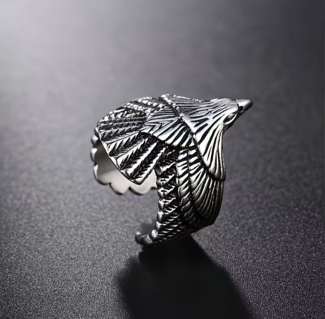 Eagle Ring (Category: Jewelry) located in Singapore. Submitted by wongahseng (Listing ID 1455137439, Image 2). Description: - Vintage silver eagle ring - Striking and detailed eagle design with spread wings - Adjustable size for a comfortable fit - Unique accessory for a bold style.