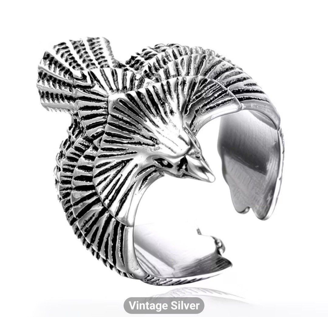 Eagle Ring (Category: Jewelry) located in Singapore. Submitted by wongahseng (Listing ID 1455137439, Image 1). Description: - Vintage silver eagle ring - Striking and detailed eagle design with spread wings - Adjustable size for a comfortable fit - Unique accessory for a bold style.