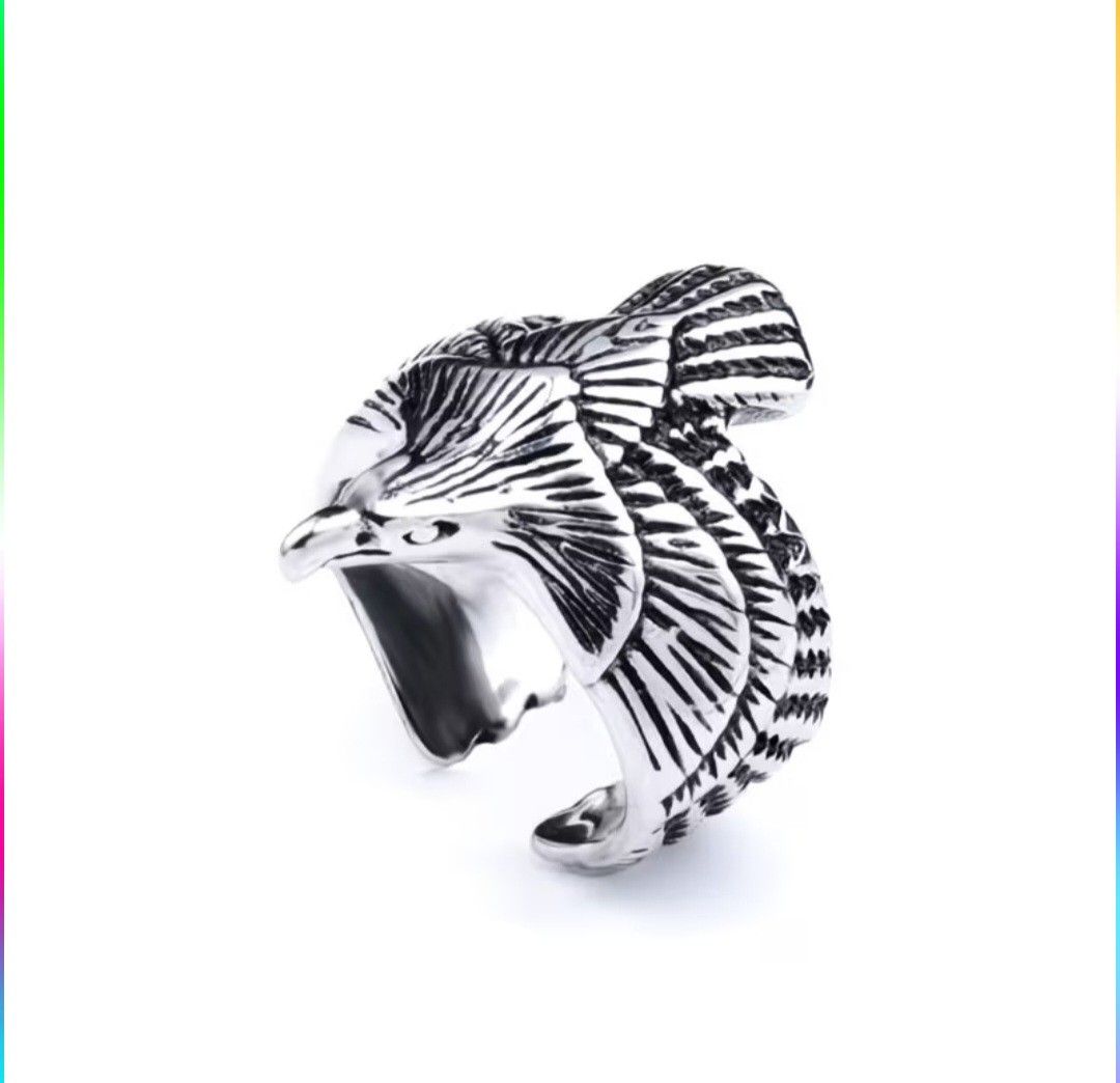 Eagle Ring (Category: Jewelry) located in Singapore. Submitted by wongahseng (Listing ID 1455137439, Image 3). Description: - Vintage silver eagle ring - Striking and detailed eagle design with spread wings - Adjustable size for a comfortable fit - Unique accessory for a bold style.