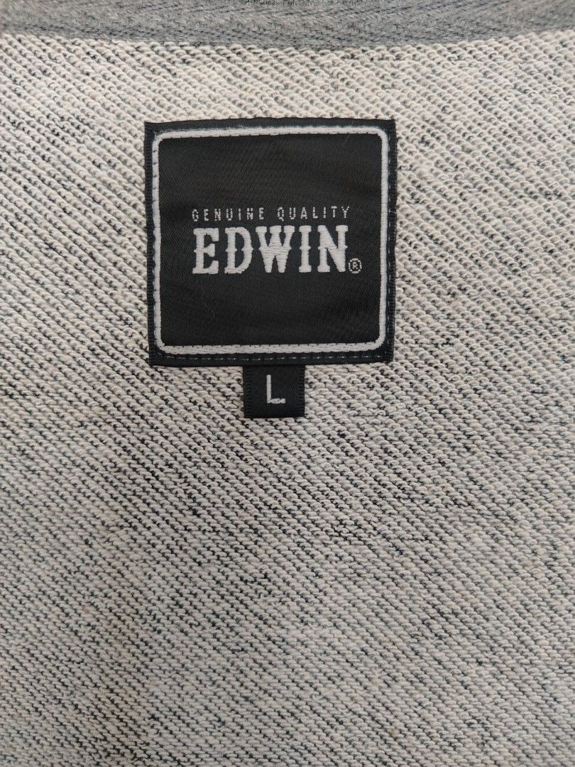 Edwin Grey Marled Crewneck Sweatshirt Size L (Category: Coats, Jackets and Outerwear) located in Davao. Submitted by enchanted08 (Listing ID 1454959139, Image 3). Description: - Edwin grey marled sweatshirt - Contrasting lighter grey band across the chest with Edwin logo - Long sleeves with ribbed cuffs and hem - Comfortable and casual design - Perfect for everyday wear.