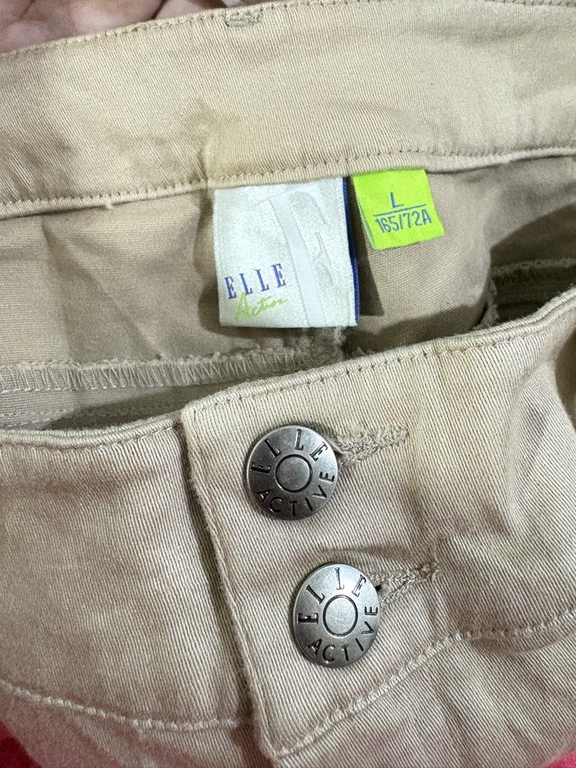 ELLE ACTIVE Convertible Zip-Off Pants Size L Beige (Category: Other Bottoms) located in Catarman. Submitted by anndadel (Listing ID 1455133906, Image 3). Description: - Brand: ELLE ACTIVE - Color: Beige - Type: Convertible Pants (Zip-off to Shorts) - Size: L (165/72A) - Closure: Two-button waist - Pockets: Front and back - Ideal for: Hiking, travel, casual wear.