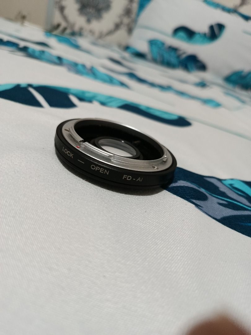 FD-AI Lens Mount Adapter Rings (Category: Lens & Kits) located in Tanay. Submitted by miabernardine (Listing ID 1455073366, Image 1). Description: FD-AI lens mount adapter ring used to attach vintage Canon FD lenses to Nikon F-mount (AI) camera bodies. With glass element..