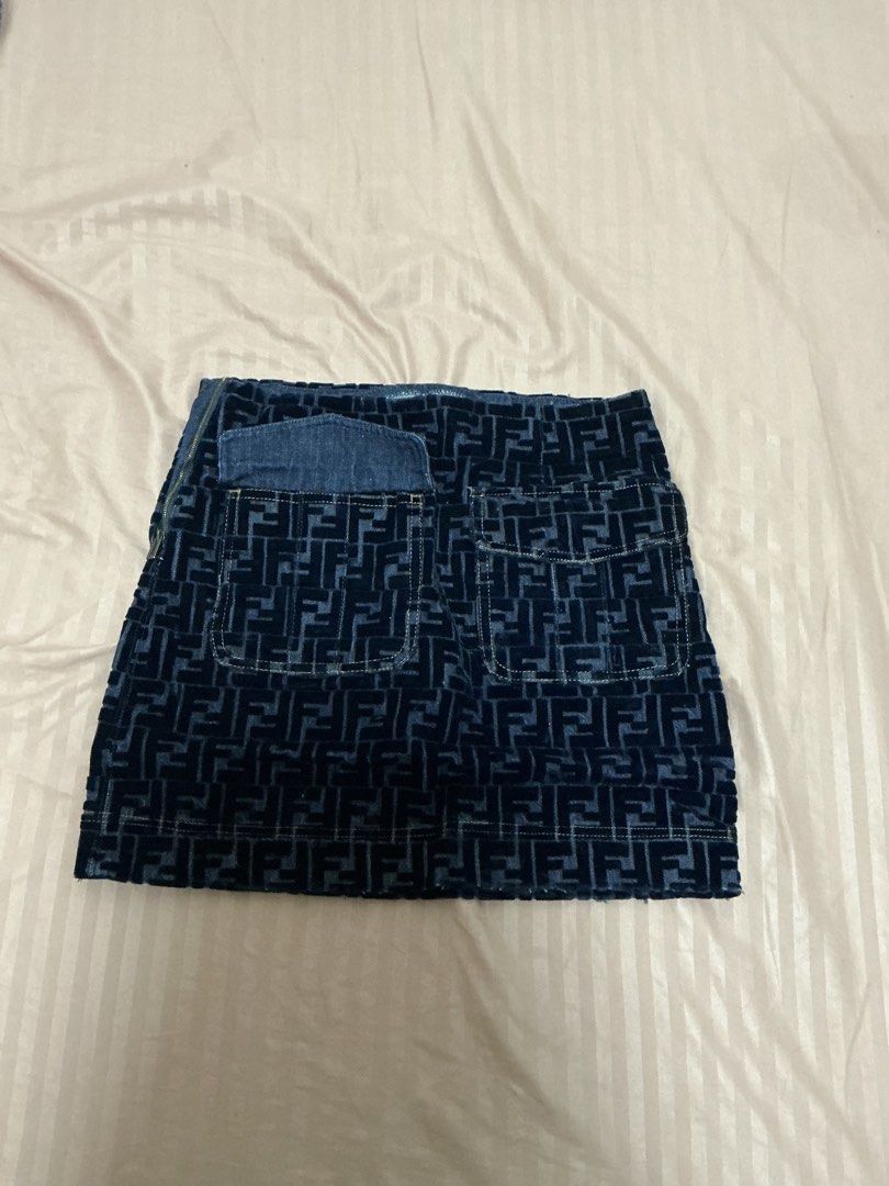 Fendi Monogram Velvet Mini Skirt (Category: Skirts) located in Quezon City. Submitted by emeii_declutter (Listing ID 1455037115, Image 2). Description: ✨ Preloved Dark Blue Velvet Mini Skirt * Iconic FF monogram pattern * Soft velvet fabric * Comfortable denim waistband * Back pockets * Side zipper closure * Stylish and versatile — perfect for casual or dressy looks 📌 Condition: Preloved / Good condition 📌 Color: Dark Blue RFS: Decluttering / M