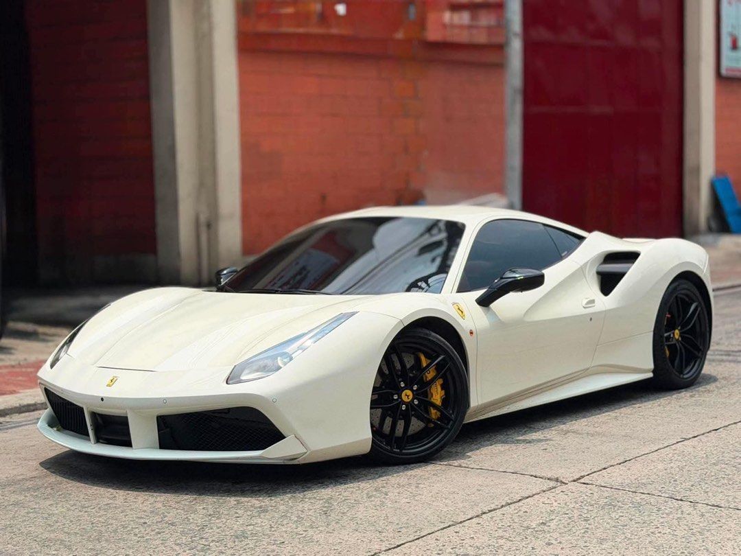 Ferrari 488 GTB Auto (Category: Used Cars) located in Manila. Submitted by quality_cars (Listing ID 1455009406, Image 3). Description: NEW ARRIVAL FORSALE ‼️ 2019 FERRARI 488 GTB 7Speed Dual Clutch Automatic Transmission 3.9L Twin-Turbo V8 Engine 11,000 KM Reading White in Color First Owner Acquired Rear-Wheel Drive 661 Horsepower @ 8,000 RPM 561 lb-ft Torque Around 205 MPH Topspeed Double Wishbone Front Suspension Multi-Link Rear w/ Adaptive Dam