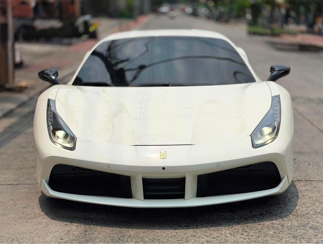 Ferrari 488 GTB Auto (Category: Used Cars) located in Manila. Submitted by quality_cars (Listing ID 1455009406, Image 1). Description: NEW ARRIVAL FORSALE ‼️ 2019 FERRARI 488 GTB 7Speed Dual Clutch Automatic Transmission 3.9L Twin-Turbo V8 Engine 11,000 KM Reading White in Color First Owner Acquired Rear-Wheel Drive 661 Horsepower @ 8,000 RPM 561 lb-ft Torque Around 205 MPH Topspeed Double Wishbone Front Suspension Multi-Link Rear w/ Adaptive Dam