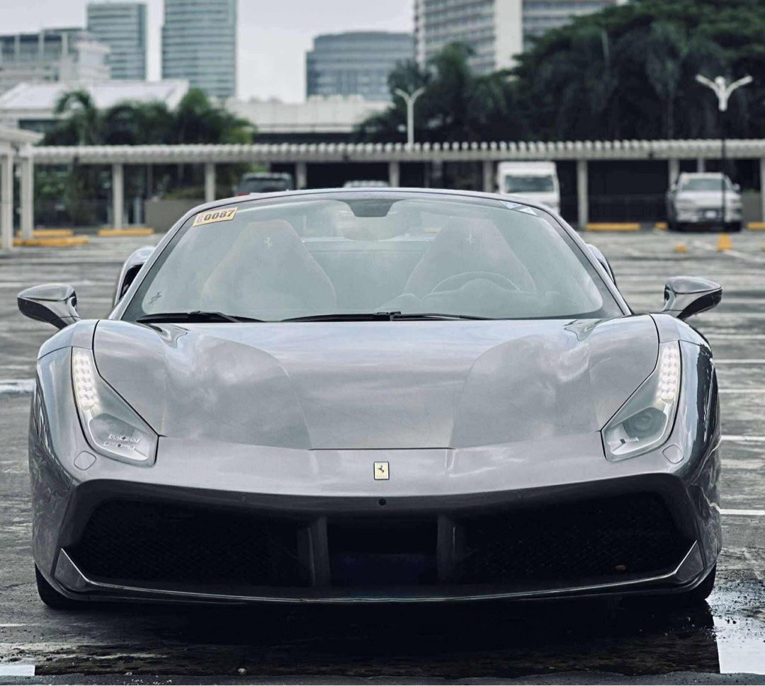 Ferrari 488 Spider GTS (Convertible) Auto (Category: Used Cars) located in Manila. Submitted by quality_cars (Listing ID 1455008698, Image 1). Description: FERRARI 488 SPIDER GTS (Convertible) Well Maintained Intact & Fresh Inside & Out All Stock & Original 2018 Acquired Transmission: 7-Speed Dual-Clutch F1 Transmission Mileage : 8,000 Only 💯 Color : Grigio Silverstone Fueltype : Gas Engine : 3.9 Liter Twin-Turbocharged V8 Engine Horsepower: 661