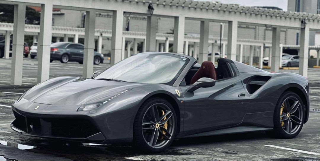 Ferrari 488 Spider GTS (Convertible) Auto (Category: Used Cars) located in Manila. Submitted by quality_cars (Listing ID 1455008698, Image 3). Description: FERRARI 488 SPIDER GTS (Convertible) Well Maintained Intact & Fresh Inside & Out All Stock & Original 2018 Acquired Transmission: 7-Speed Dual-Clutch F1 Transmission Mileage : 8,000 Only 💯 Color : Grigio Silverstone Fueltype : Gas Engine : 3.9 Liter Twin-Turbocharged V8 Engine Horsepower: 661