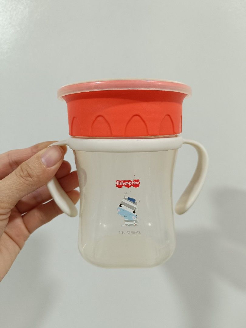 Fisher-Price Training Sippy Cup (pair) (Category: Weaning & Toddler Feeding) located in San Mateo. Submitted by aubrey.s (Listing ID 1455083551, Image 3). Description: - Adorable Fisher-Price training sippy cup - Designed with easy-grip handles for little hands. - Comes with a secure-sealing red lid - Ideal for babies and toddlers learning to drink independently - Fox and Zebra ( may be sold separately at 80 each).