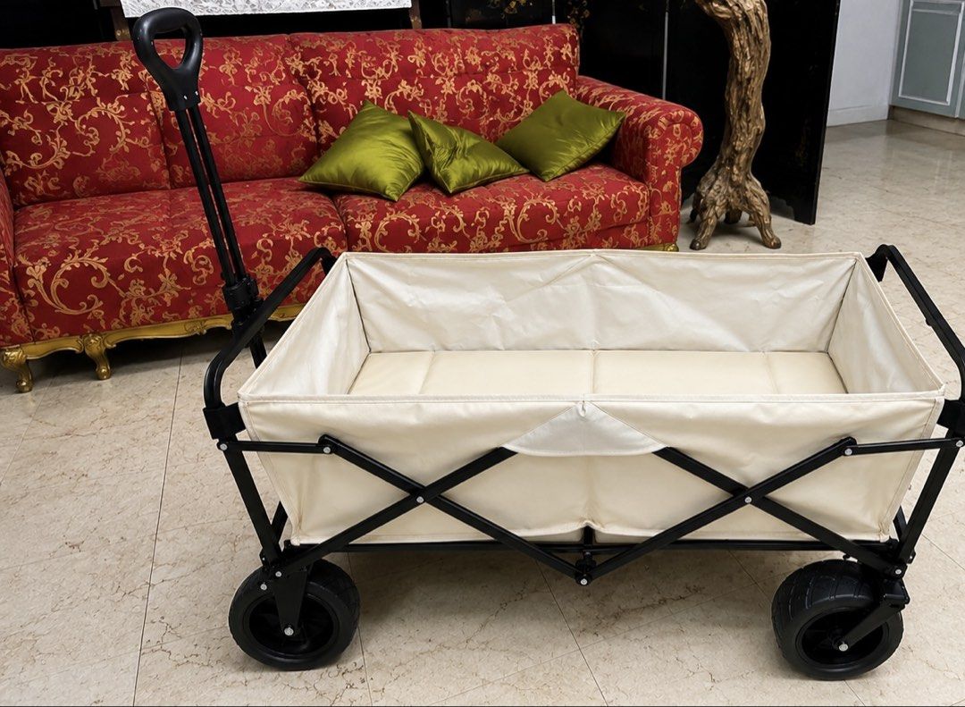 Folding Wagon with Handle XL (Category: Strollers) located in Manila. Submitted by dianefroil27209 (Listing ID 1455055746, Image 1). Description: - Sturdy black frame and cream fabric bin - Easy-pull handle for effortless transport - Solid wheels suitable for various terrains - Folds compactly for convenient storage - Perfect for camping, beach trips, and backyard use.