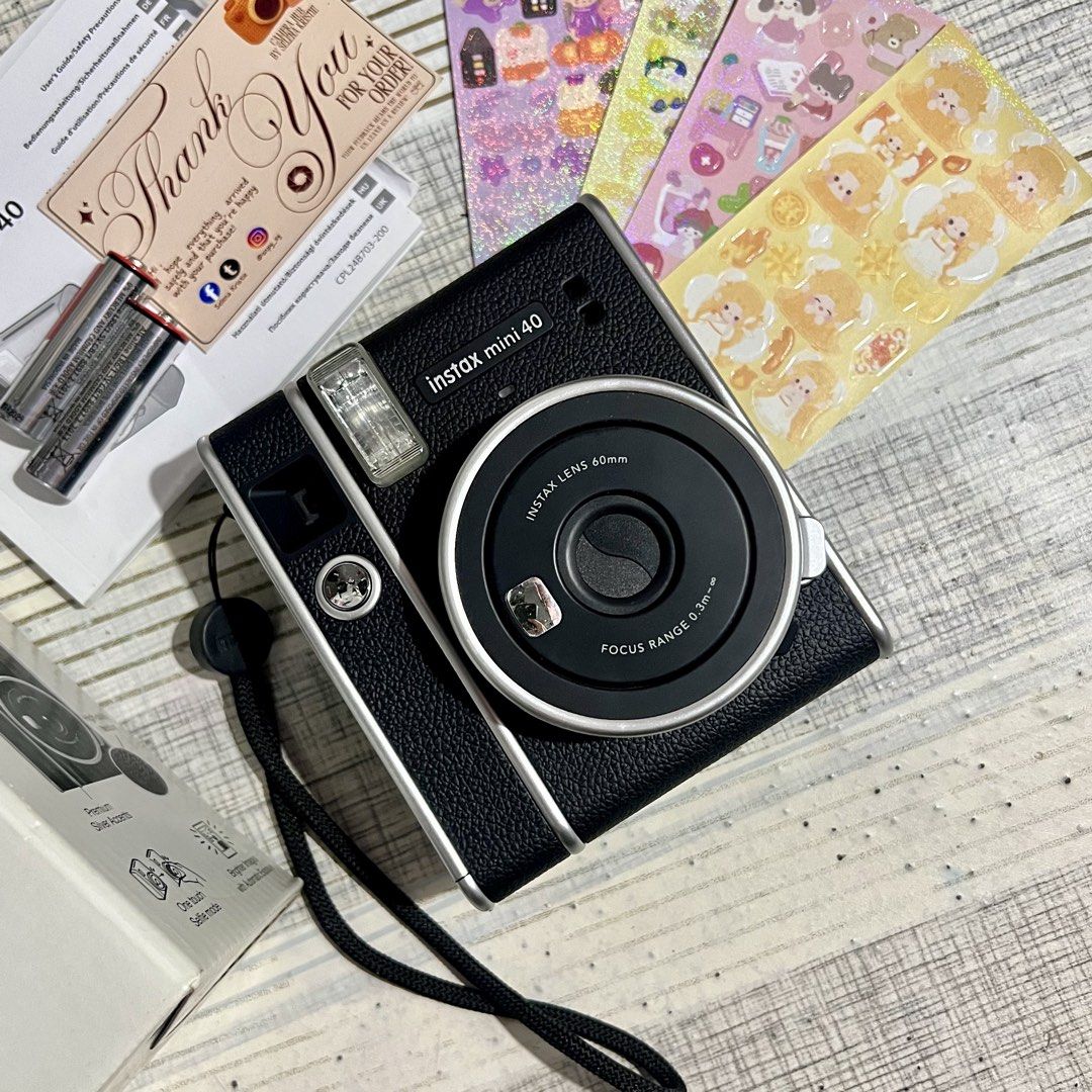 Fujifilm Instax Mini 40 (Category: Announcements) located in Makati City. Submitted by CameraHubPH (Listing ID 1455042500, Image 3). Description: 🎀 Fujifilm Instax Mini 40 Instant Camera 🎀 ✨ Classic Black / Charcoal Black Color 🖤 ✨ 100% Working | Fully Tested ✨ Cute vintage-inspired design ✨ Perfect for everyday memories, travel, gifts & journaling 📸🎞️ 📦 INCLUSIONS: ♡ Fujifilm Instax Mini 40 Unit ♡ Original Box ♡ Original User Guide / Manua