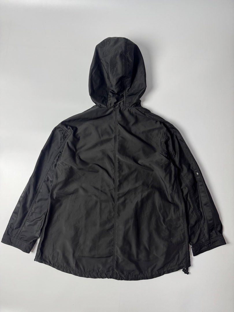 GU Black Hooded Lightweight Jacket (Category: Coats, Jackets and Outerwear) located in Cavite. Submitted by dracokidstuff (Listing ID 1455139155, Image 2). Description: - Black GU jacket with attached hood - Lightweight material, ideal for layering or mild weather - Full zip-up front with snap button closures - Features both front and internal pockets - Adjustable drawstring hem for a customized fit - Button tab closures on sleeve cuffs - Compact