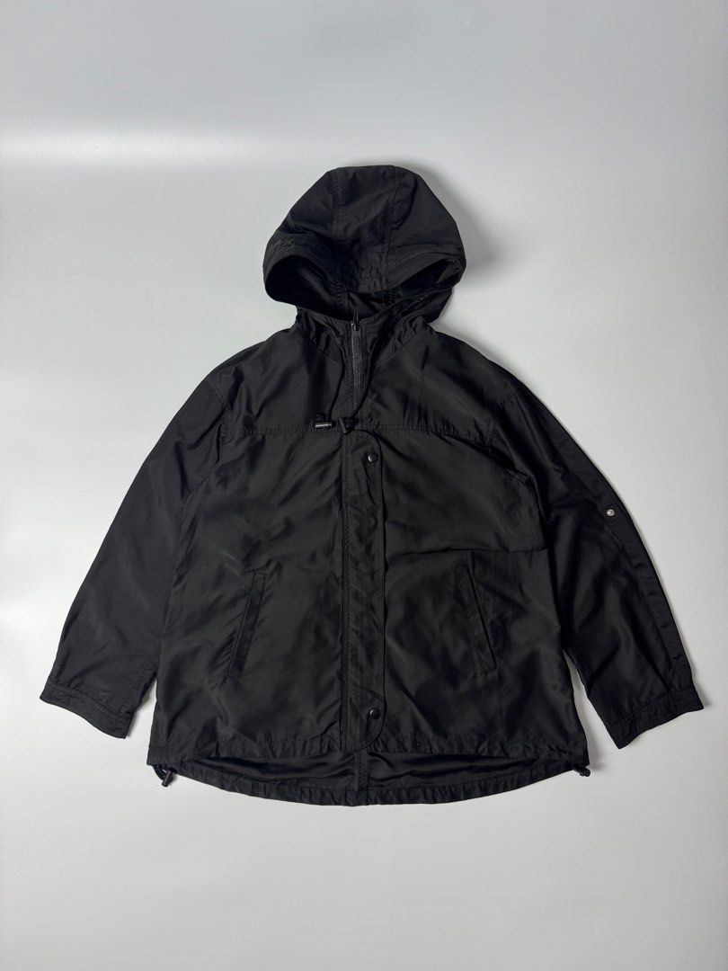 GU Black Hooded Lightweight Jacket (Category: Coats, Jackets and Outerwear) located in Cavite. Submitted by dracokidstuff (Listing ID 1455139155, Image 1). Description: - Black GU jacket with attached hood - Lightweight material, ideal for layering or mild weather - Full zip-up front with snap button closures - Features both front and internal pockets - Adjustable drawstring hem for a customized fit - Button tab closures on sleeve cuffs - Compact