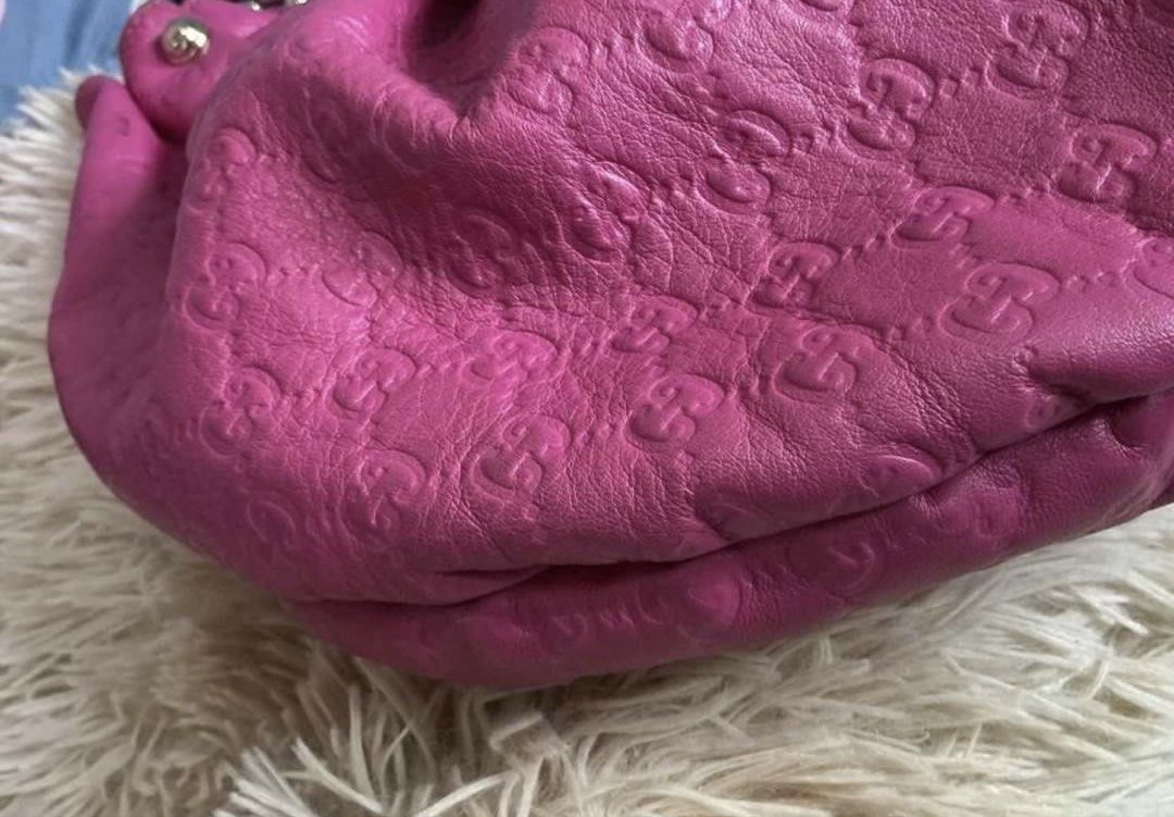 Guccissima Studded Hobo Handbag (Category: Luxury Bags & Wallets) located in Manila. Submitted by happytree.8a64d5 (Listing ID 1455050565, Image 3). Description: - its a. Authentic Pink Gucci Hobo Bag - Classic GG monogram embossed all over leather - Gathered detail at the top with gold stud accents - Interior zip pocket and Gucci tag - Sturdy handles with some signs of wear - Stylish and practical for everyday use - rfs: i need to let go of her 