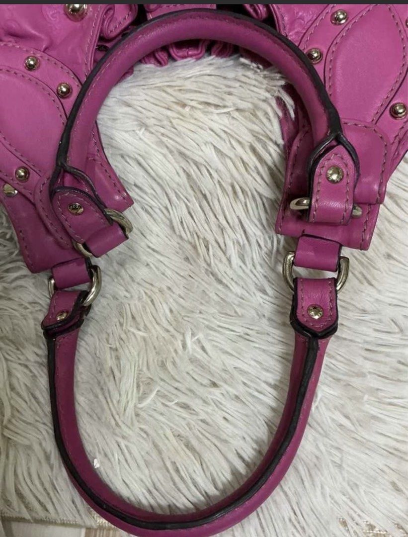 Guccissima Studded Hobo Handbag (Category: Luxury Bags & Wallets) located in Manila. Submitted by happytree.8a64d5 (Listing ID 1455050565, Image 2). Description: - its a. Authentic Pink Gucci Hobo Bag - Classic GG monogram embossed all over leather - Gathered detail at the top with gold stud accents - Interior zip pocket and Gucci tag - Sturdy handles with some signs of wear - Stylish and practical for everyday use - rfs: i need to let go of her 