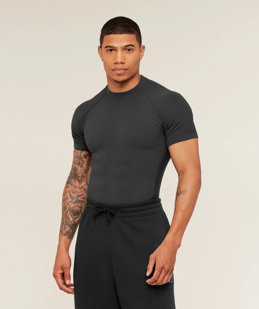 Gymshark Training T-Shirt - Dark Grey (Category: Activewear) located in Quezon City. Submitted by miketerr (Listing ID 1455032620, Image 3). Description: GYMSHARK PHYSIQUE T-SHIRT - GREY/BLACK Price: ₱4,750 Size: Large Condition: Brand New Without Tags Color: Grey / Black Fit: Muscle Fit Original Gymshark Physique T-Shirt in Grey/Black. Brand new and never worn, just without the original tags. Premium fitted short-sleeve training top with a physi