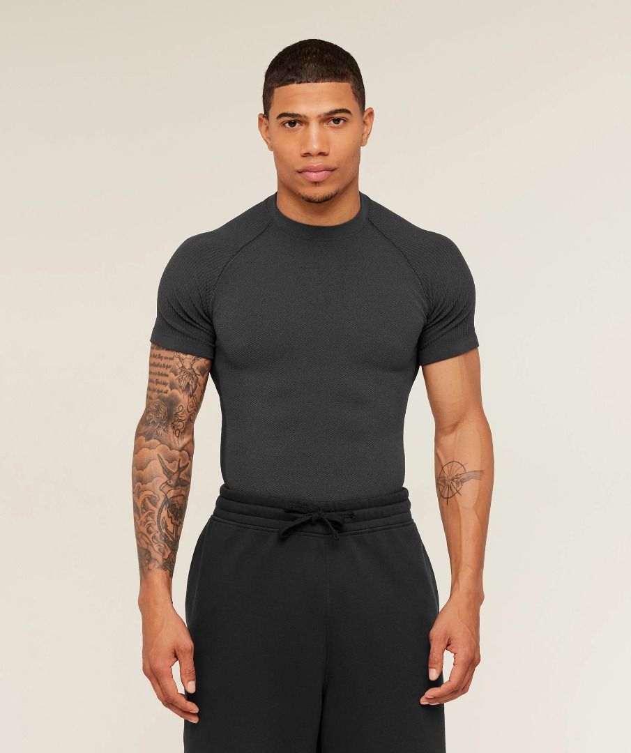 Gymshark Training T-Shirt - Dark Grey (Category: Activewear) located in Quezon City. Submitted by miketerr (Listing ID 1455032620, Image 1). Description: GYMSHARK PHYSIQUE T-SHIRT - GREY/BLACK Price: ₱4,750 Size: Large Condition: Brand New Without Tags Color: Grey / Black Fit: Muscle Fit Original Gymshark Physique T-Shirt in Grey/Black. Brand new and never worn, just without the original tags. Premium fitted short-sleeve training top with a physi