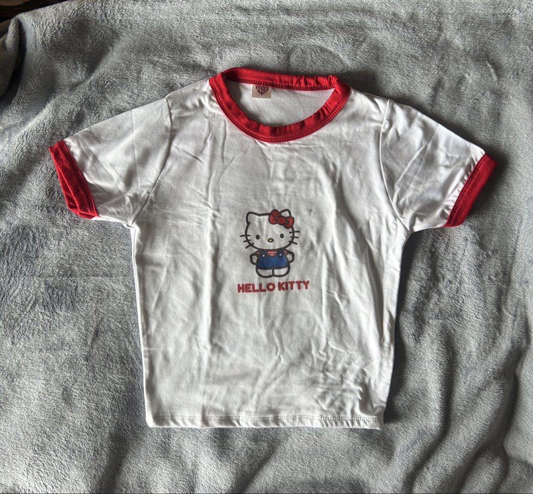 Hello Kitty Shirt (Category: Shirts) located in Manila. Submitted by chowmps_ (Listing ID 1455014952, Image 1). Description: Hello Kitty Fitted Shirt Size: XS/Small Never Worn RFS: Decluttering ˃̵ᴗ˂̵ DM for inquiries! For Pick-up or Lalamove only MOP: Gcash.
