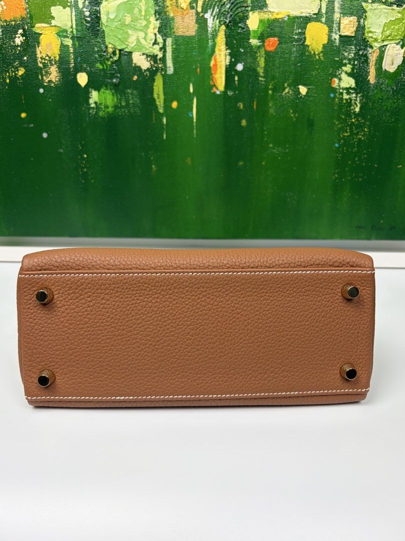 Hermes Kelly 25 (Category: Luxury Bags & Wallets) located in Mabalacat. Submitted by to_ph (Listing ID 1455091009, Image 3). Description: ✨AVAILABLE✨ HERMES KELLY 25 Best Price ₱1,000,000 Condition: Excellent 9/10 Color: Gold with contrast stitching Hardware: Gold Hardware Inclusions: box, dust bag, care booklet,receipt, lock, keys and clochette, receipt,ribbon,rain coat Date Code: U (2022) .