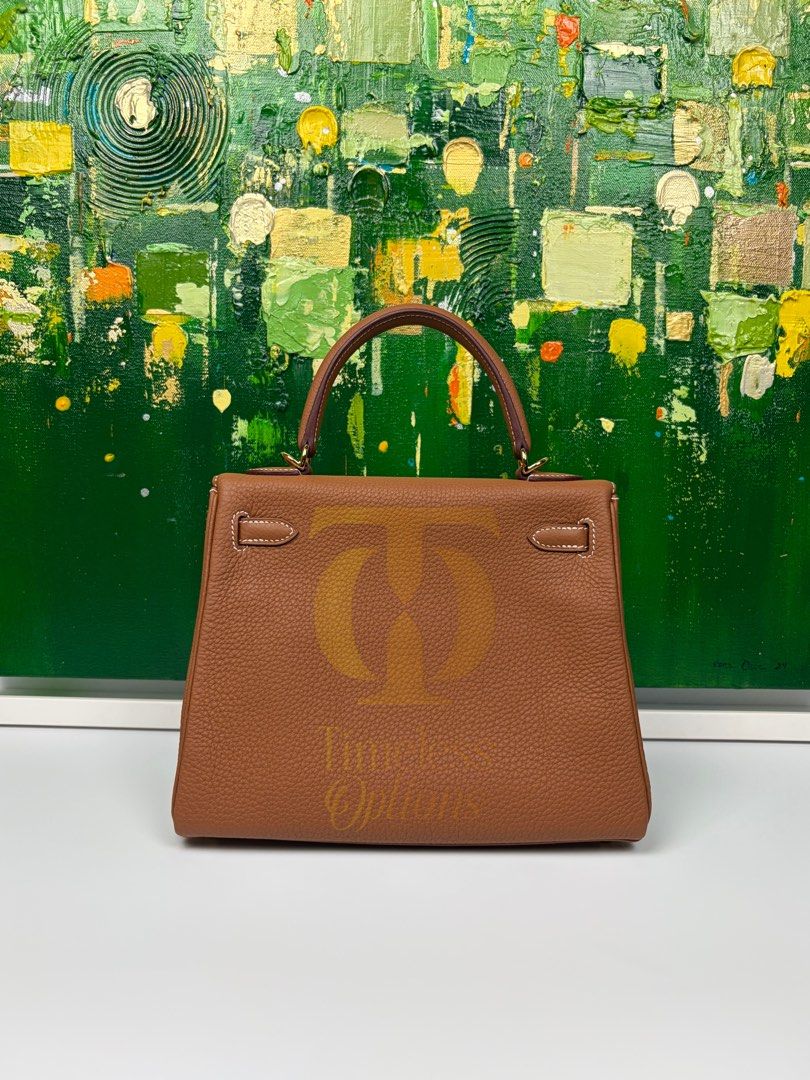 Hermes Kelly 25 (Category: Luxury Bags & Wallets) located in Mabalacat. Submitted by to_ph (Listing ID 1455091009, Image 2). Description: ✨AVAILABLE✨ HERMES KELLY 25 Best Price ₱1,000,000 Condition: Excellent 9/10 Color: Gold with contrast stitching Hardware: Gold Hardware Inclusions: box, dust bag, care booklet,receipt, lock, keys and clochette, receipt,ribbon,rain coat Date Code: U (2022) .