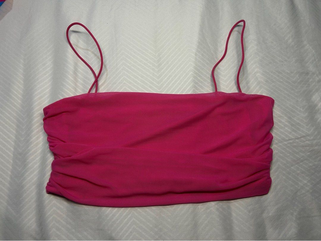 Hot Pink Mesh Ruched Tube Top (Category: Others Tops) located in Manila. Submitted by fromrie (Listing ID 1455095699, Image 2). Description: - Super cute hot pink mesh tube top - Features a ruched front for a flattering fit - Adjustable tie details on the sides for a customized look - Stretchy material for comfort and flexibility - Perfect for a night out or a festival outfit - Easily pairs with jeans or skirts for a stylish ensemble .