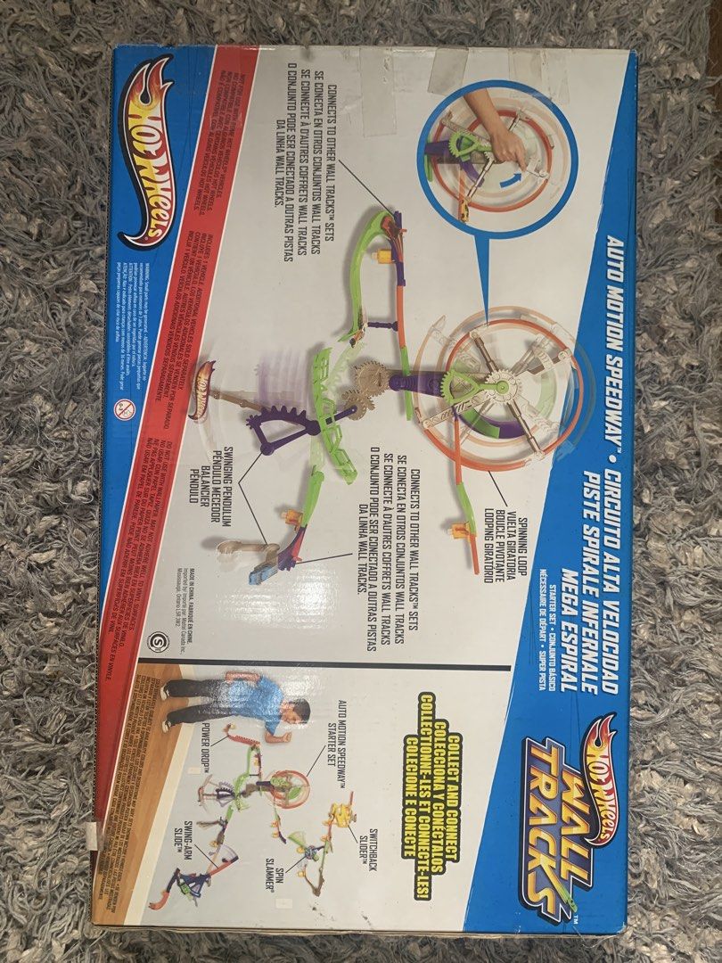 Hot Wheels Wall Tracks Auto Motion Speedway Spinning Loop (Category: Action & Battle Toys) located in Rizal. Submitted by bien_aime (Listing ID 1454995702, Image 2). Description: - Hot Wheels Wall Tracks Auto Motion Speedway - Features a spinning loop and pendulum - Connects to other Wall Tracks sets - Includes one car - Provides hours of fun for kids.