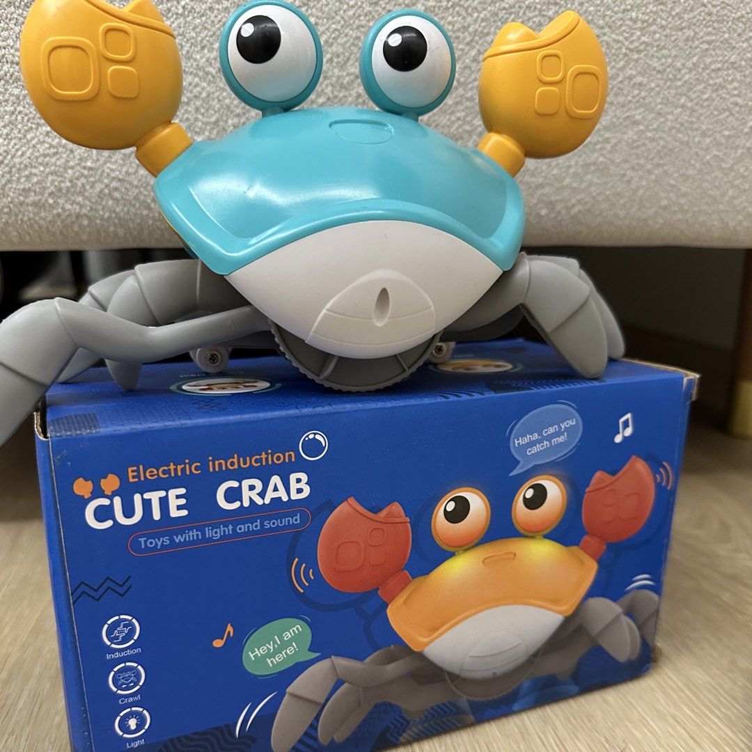 Interactive Dancing Crab (Category: Interactive Toys) located in Singapore. Submitted by shopeverythinghere (Listing ID 1455030715, Image 1). Description: - Interactive Dancing Crab toy - Features lights and sounds - Induction movement allows it to crawl and move autonomously - Another Colour available - Suitable for toddlers and children.