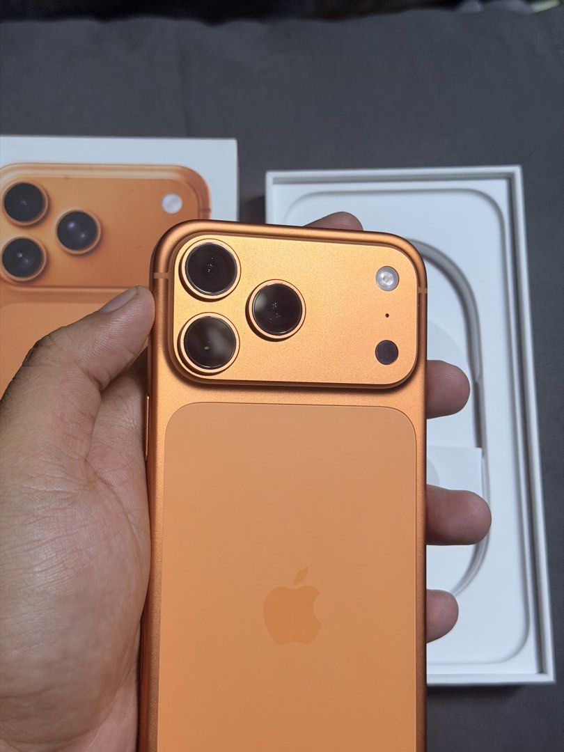 iPhone 17 Pro max 256 GB (Category: iPhone 17 Series) located in Manila. Submitted by unkowns (Listing ID 1455130953, Image 2). Description: FOR SALE / SWAP + Cash iPhone 17 Pro Max 256 GB (ORANGE) Local Variant Factory Unlock 100% BH 54cc No issue / No history of repair All feautures Working NtC Approved Under warranty Til 2027 inclusions unit, Cord, & Orig box 📍MEET UP ONLY Manila | San pedro Laguna.