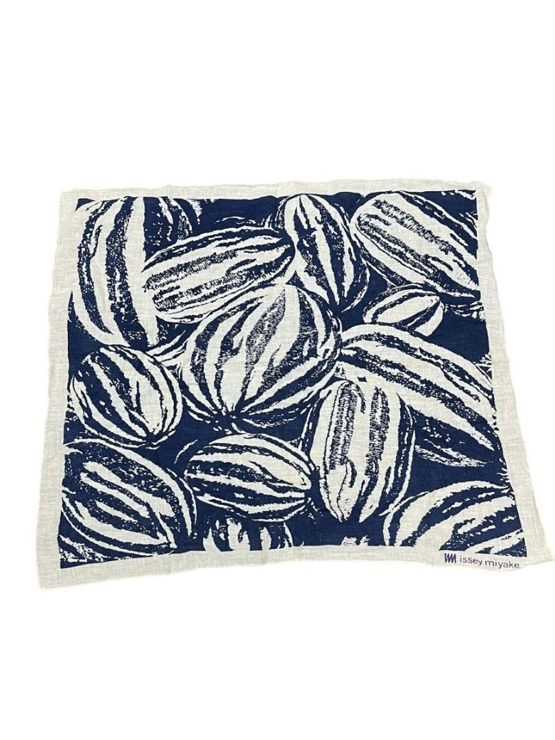 Issey Miyake Handkerchief (Category: Handkerchief & Pocket Squares) located in Zamboanga. Submitted by archivist_ (Listing ID 1455132397, Image 1). Description: Vintage Issey Miyake botanical graphic scarf/handkerchief in deep navy and off-white. Featuring a bold melon/cacao pod line-art print and signature IM corner logo. Wear it as a neckerchief, pocket square, or frame it as a modern piece of textile wall art. Material: Gauge/Cotton Blend 1000