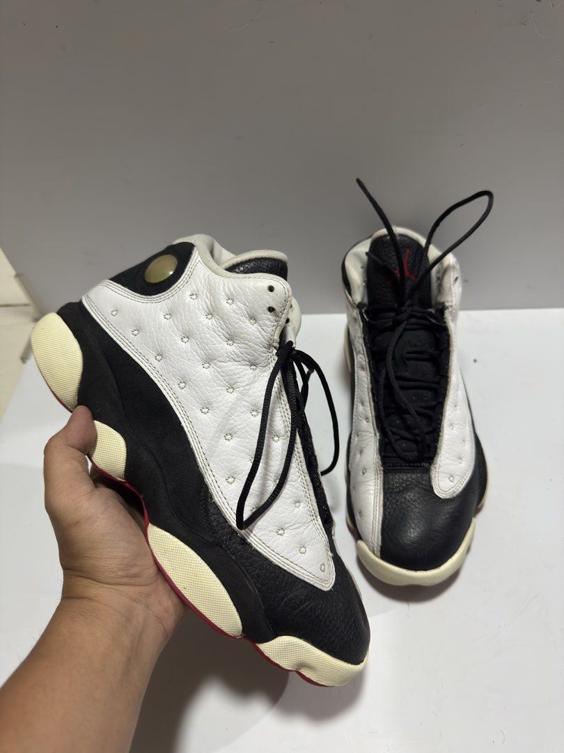 Jordan 13 Retro HGG 2018 (Category: Sneakers) located in Manila. Submitted by mislangers_stuff (Listing ID 1455138024, Image 2). Description: - Air Jordan 13 XIII Playground edition - Classic black and white colorway with red accents - Mid-top silhouette - Black laces - Iconic Jordan hologram on the side - Ideal for Jordan collectors.