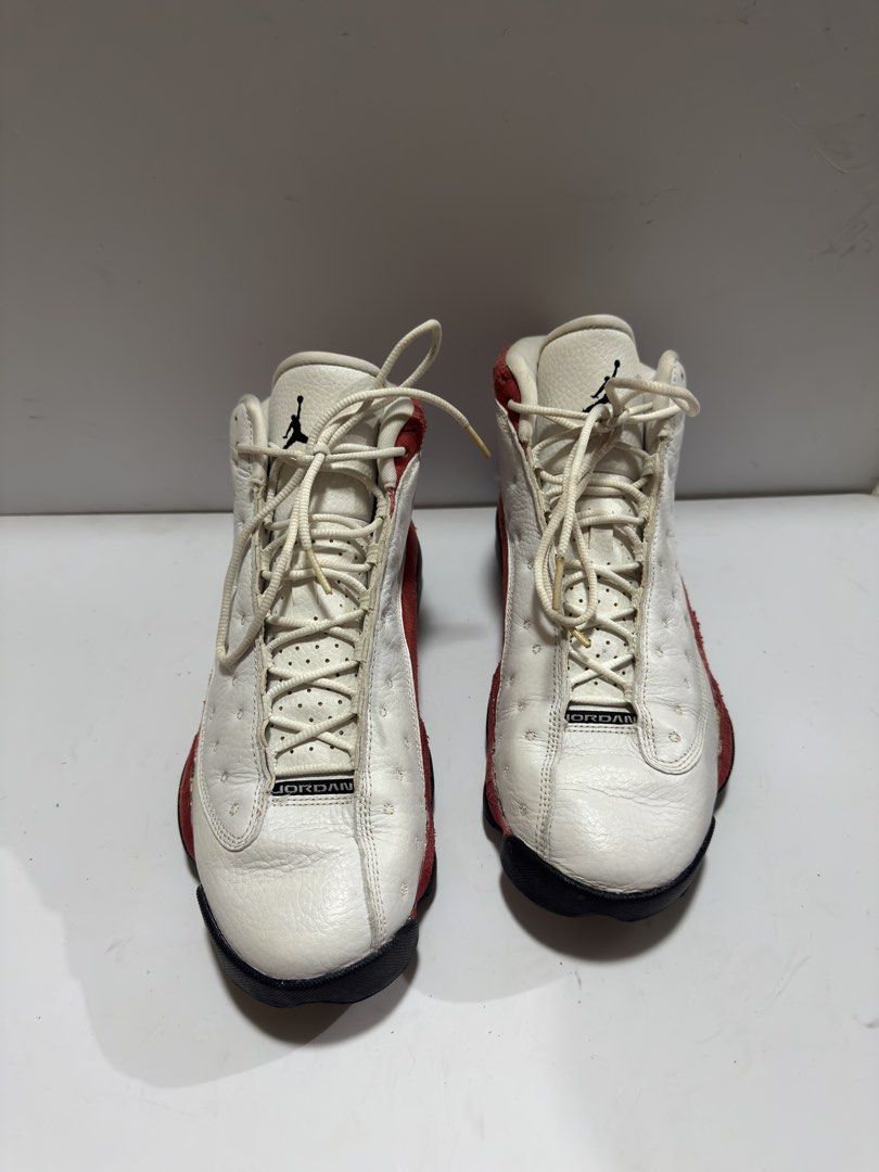 Jordan 13 Retro OG Chicago 2017 (Category: Sneakers) located in Manila. Submitted by mislangers_stuff (Listing ID 1455139482, Image 3). Description: - Classic Air Jordan 13s - Colorway: White, Red, Black - Size: US Men's 9.5 - Condition: Used, with visible wear on soles and suede - Still has plenty of life left for wear - Ideal for Air Jordan collectors or casual wear.