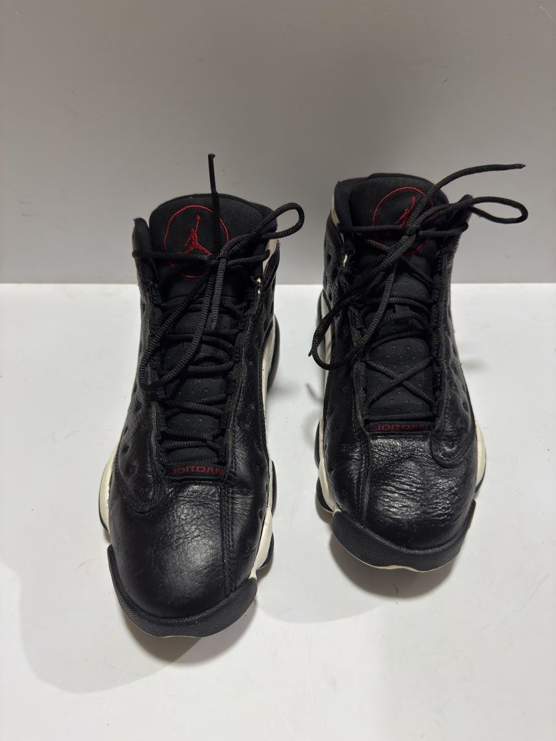 Jordan 13 Retro Reverse HGG (Category: Sneakers) located in Manila. Submitted by mislangers_stuff (Listing ID 1455138084, Image 3). Description: - Classic black and white Air Jordan 13s - Red accents on tongue and heel - Mid-top style - Textured leather upper - White and black sole - Ideal for collectors or everyday wear.
