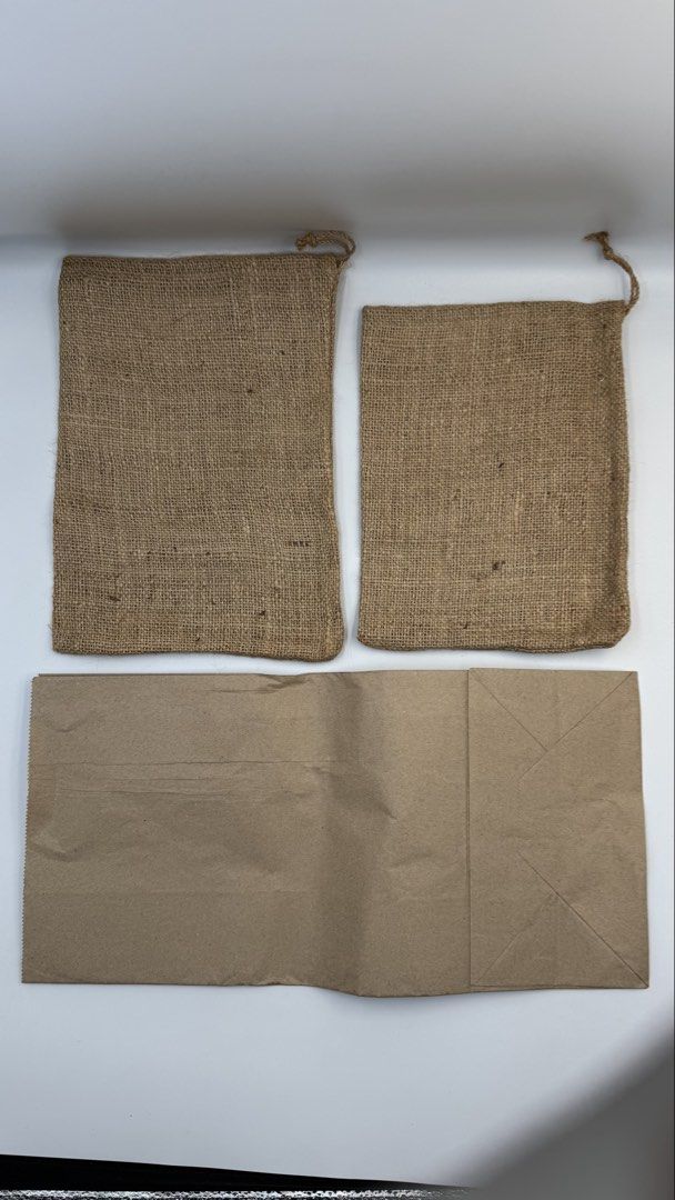 Jute Bags and Paper Bag Set (Category: Luxury Bags & Wallets) located in Manila. Submitted by mysticstar_d67ad3_tree (Listing ID 1455064722, Image 1). Description: Set includes: - jute/burlap drawstring bags: Big: 8 in. x 11 in. - 15 pcs. Small: 7 in. x 10 in. - 12 pcs. - Large brown paper bags: 8 in. X 16.5 in. 73 pcs. - Ideal for storage or gifting. - Large brown paper bag is sturdy and versatile. - Great for organizing items or packaging purch