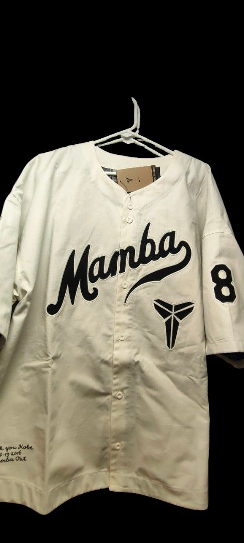 Kobe Bryant Mamba 24 Baseball Jersey (Category: Activewear) located in Manila. Submitted by acdouble-r (Listing ID 1455102573, Image 1). Description: - White baseball jersey celebrating Kobe Bryant. - Features 'Mamba' and '24' on the back. - Includes the iconic Kobe Bryant logo. - Embroidered tribute: 'Thank you Kobe 04.13.2016 Mamba Out' at the bottom. - A must-have collectible for any devoted Kobe fan..