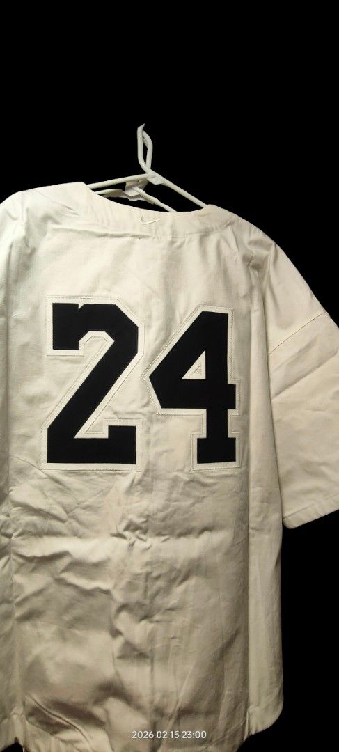 Kobe Bryant Mamba 24 Baseball Jersey (Category: Activewear) located in Manila. Submitted by acdouble-r (Listing ID 1455102573, Image 2). Description: - White baseball jersey celebrating Kobe Bryant. - Features 'Mamba' and '24' on the back. - Includes the iconic Kobe Bryant logo. - Embroidered tribute: 'Thank you Kobe 04.13.2016 Mamba Out' at the bottom. - A must-have collectible for any devoted Kobe fan..