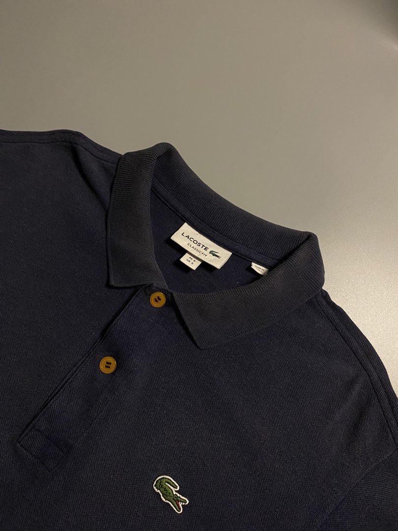 Lacoste Navy Blue Polo Shirt (Category: Tshirts & Polo Shirts ) located in Valladolid. Submitted by cl.archives (Listing ID 1455103310, Image 3). Description: Lacoste Navy Blue Polo Shirt FR3 / US Small on Tag 18x27 V-Good Condition.