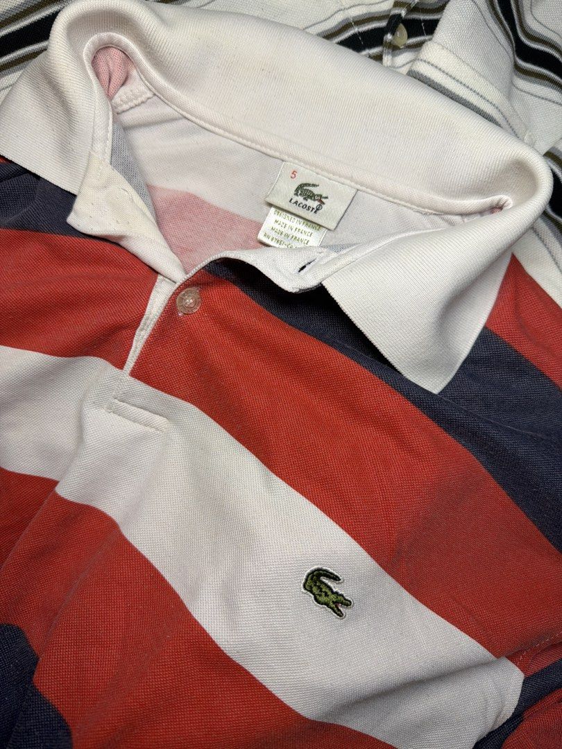 Lacoste Striped Polo Shirt (Category: Tshirts & Polo Shirts ) located in Manila. Submitted by D3CLUTTER (Listing ID 1455059458, Image 2). Description: Classic Lacoste Stripe polo shirt Dimes: W 21.5 L 28 ₱500 Message for more details and issues.