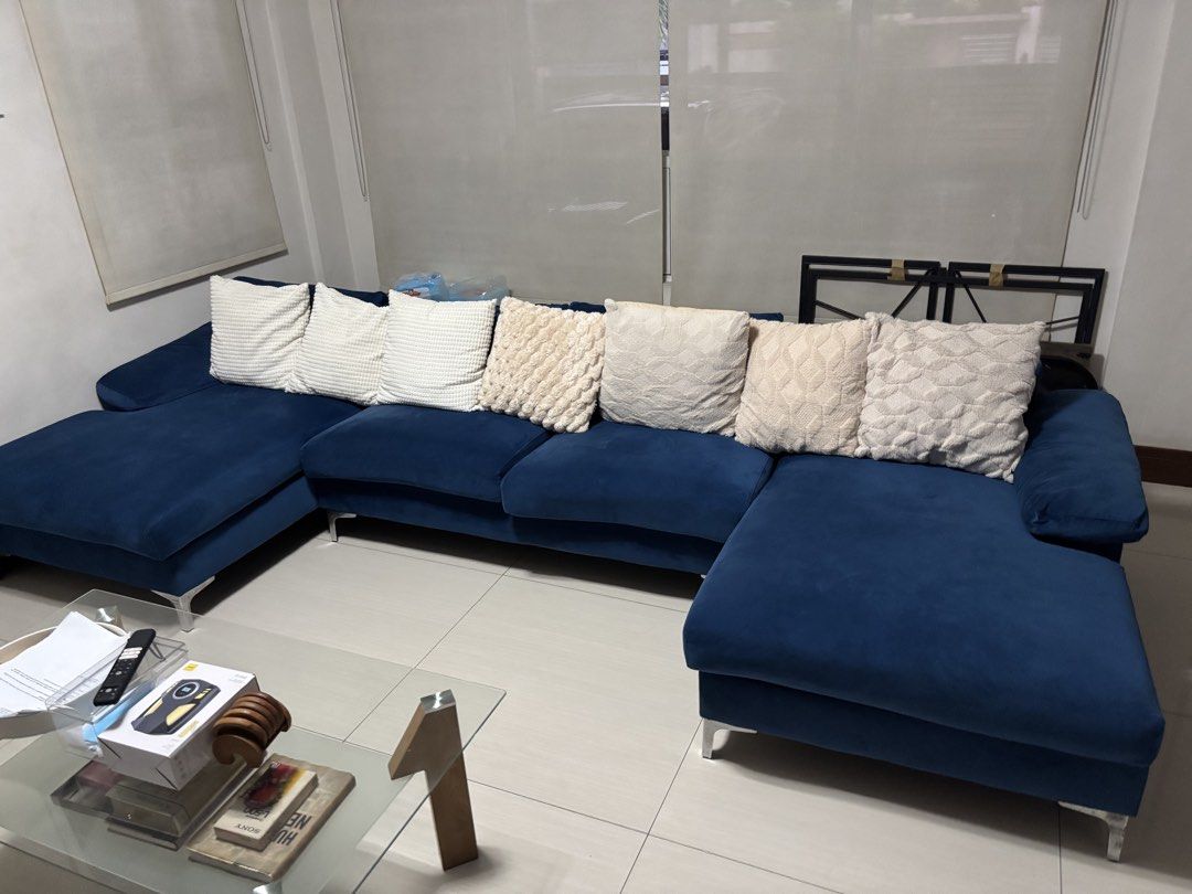 Large Blue C-Shaped Sofa (Category: Sofas) located in Quezon City. Submitted by glc157 (Listing ID 1454957163, Image 3). Description: - Spacious C/U-shaped sectional sofa - Deep blue velvet fabric - Ample seating for the whole family - Modern design with sleek metal legs - Ideal for living rooms or entertainment areas - Easy to arrange in different configurations Original price: 30k RFS: changing furniture.