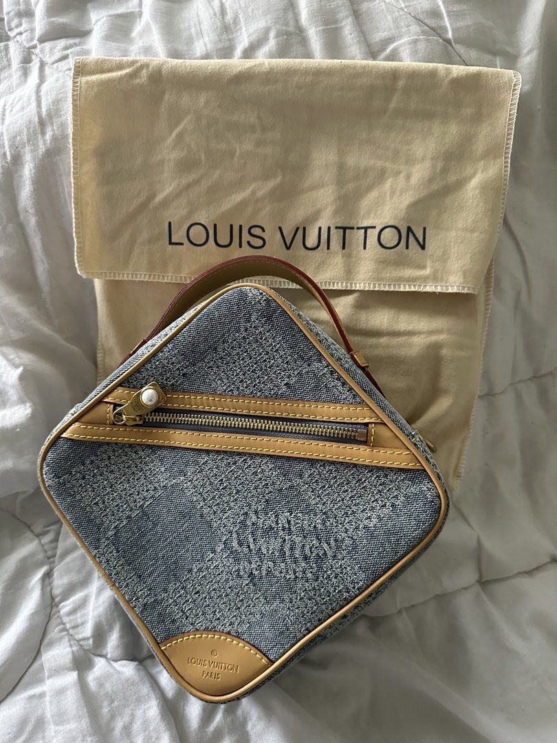 Louis Vuitton Monogram Denim Vanity Case (Category: Luxury Bags & Wallets) located in Marikina City. Submitted by alen13 (Listing ID 1454998923, Image 2). Description: - Louis Vuitton Vanity Case - Monogram Denim material - Tan leather trim and handle - Zipper closure - Detachable shoulder strap included - Dust bag included - Ideal for travel or everyday use.
