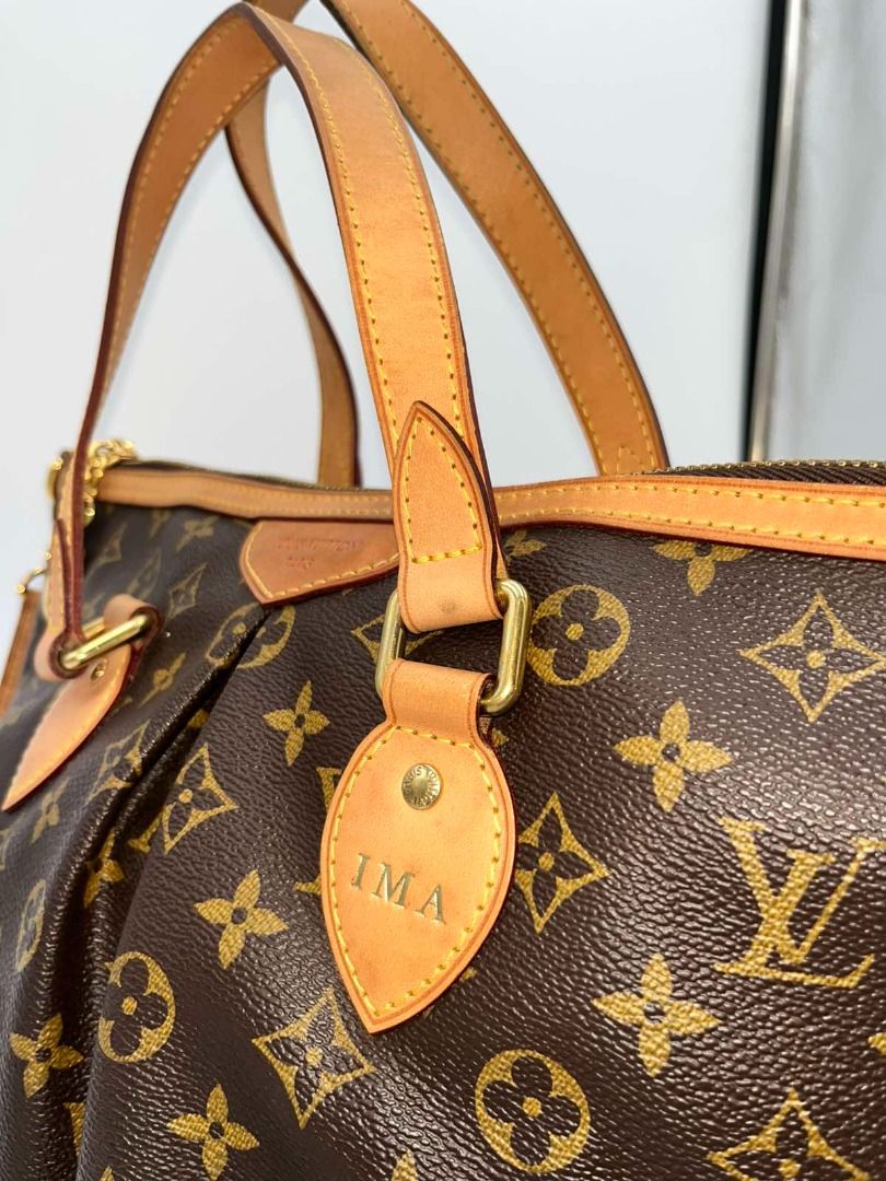 Louis Vuitton Palermo PM (Petit Modele) (Category: Luxury Bags & Wallets) located in Manila. Submitted by happy.clara (Listing ID 1455016427, Image 3). Description: - Features rolled leather handles and a detachable shoulder strap. - Gold-tone hardware throughout. - Includes a cute LV charm attached to the zipper. - Leather shows a beautiful, desirable patina. - Spacious interior for all your essentials. - A timeless and versatile piece for every