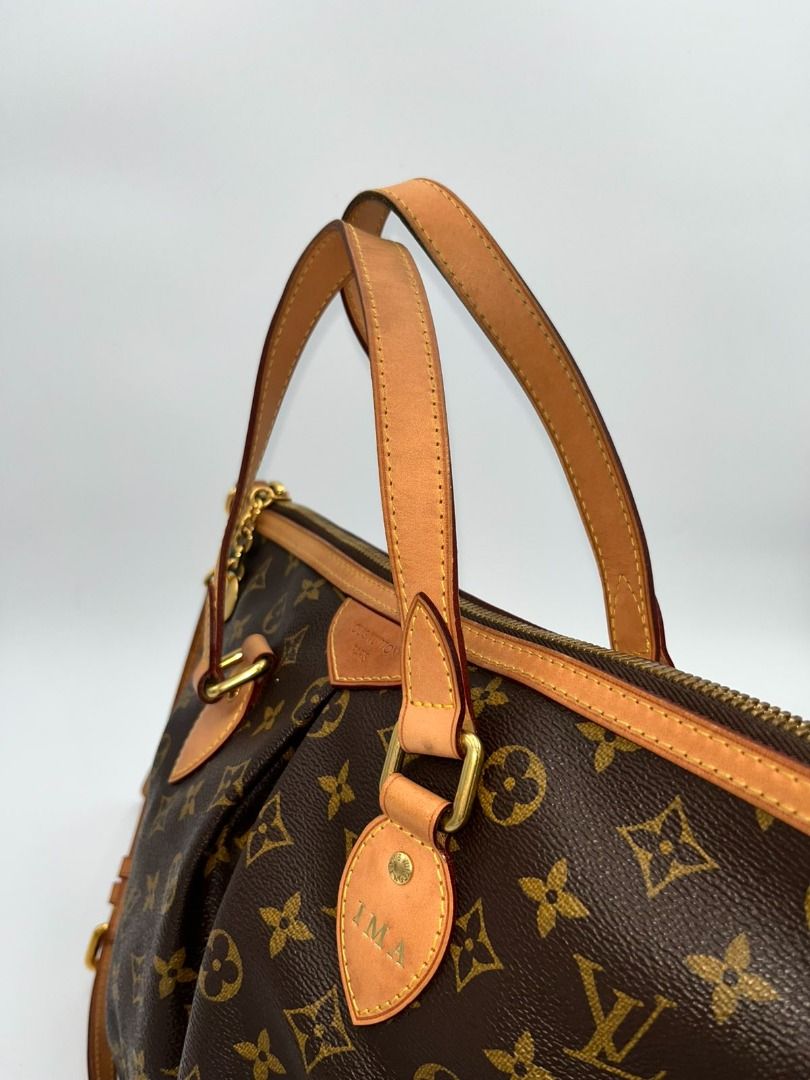 Louis Vuitton Palermo PM (Petit Modele) (Category: Luxury Bags & Wallets) located in Manila. Submitted by happy.clara (Listing ID 1455016427, Image 2). Description: - Features rolled leather handles and a detachable shoulder strap. - Gold-tone hardware throughout. - Includes a cute LV charm attached to the zipper. - Leather shows a beautiful, desirable patina. - Spacious interior for all your essentials. - A timeless and versatile piece for every