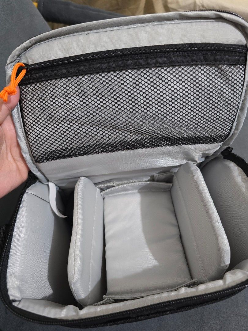 Lowepro Format 160 Camera Bag (Category: Camera Bags & Carriers) located in Makati City. Submitted by nikin07 (Listing ID 1454972541, Image 3). Description: - Brand: Lowepro - Model: Format 160 - Features padded dividers for camera gear - Includes a mesh pocket for accessories - Comes with a handle and a removable shoulder strap - Designed for excellent camera and lens protection.