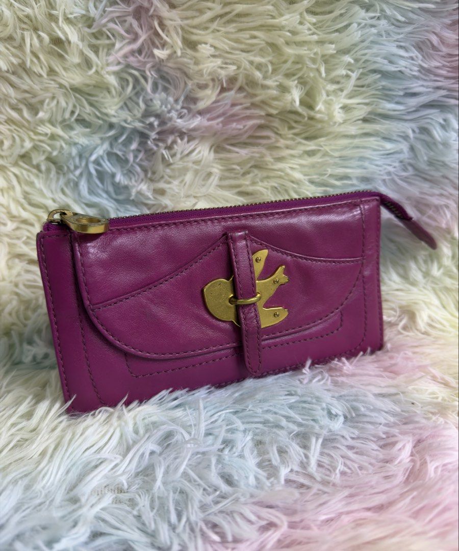 Marc By Marc Jacobs Leather wallet (Category: Luxury Bags & Wallets) located in Rizal. Submitted by affordabagz (Listing ID 1455040327, Image 2). Description: 🏷️ Brand: MARC BY MARC JACOBS — engraved zipper pull ✨ Material: Genuine leather — vibrant magenta / fuschia pink 🏭 Origin: Made in China — style code: M3113446 📂 Style: Long zip-around wallet with front flap & gold-tone logo hardware 💳 Features: Multiple card slots, bill compartments, 