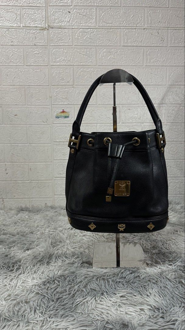 MCM bucket bag (Category: Luxury Bags & Wallets) located in Manila. Submitted by paulovenegaskalakal2020 (Listing ID 1454966858, Image 1). Description: For sale! Kalakal MCM bucket leather bag WOMENS Small Width- 11 inches Length- 8 inches Sides- 5.5 inches Minimal stain & fade leather Minimal tarnish harware Missing leather adjustable sling Sign of usage Good MINE 4,995 +sf.