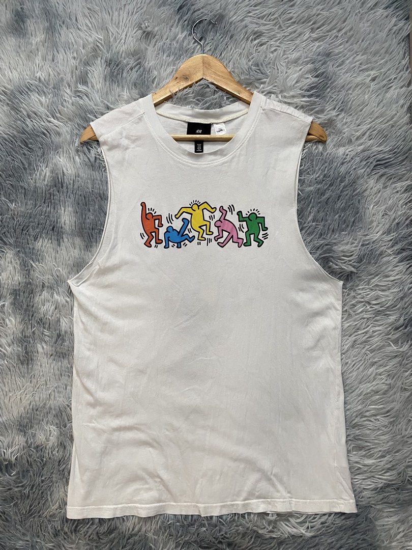 Men's H&M x Keith Haring Vest Top (Category: Vests) located in Carmen. Submitted by yawbuangaka (Listing ID 1455022452, Image 2). Description: Men's H&M x Keith Haring Vest Top White Medium Length - 28 Width - 20 In very good condition.