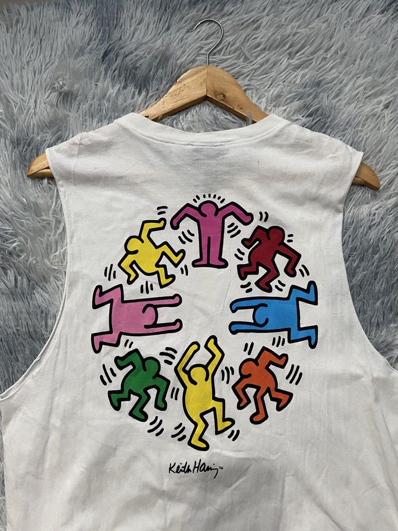 Men's H&M x Keith Haring Vest Top (Category: Vests) located in Carmen. Submitted by yawbuangaka (Listing ID 1455022452, Image 3). Description: Men's H&M x Keith Haring Vest Top White Medium Length - 28 Width - 20 In very good condition.
