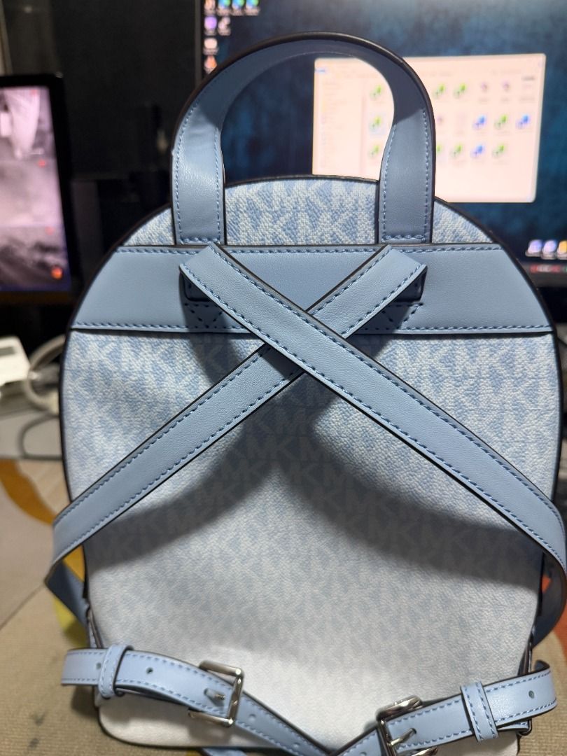 Michael Kors Jaycee MD Zip Pocket Backpack LT SKY (Category: Backpacks) located in Muntinlupa City. Submitted by zerolock (Listing ID 1455058112, Image 3). Description: - Authentic Michael Kors Jaycee Backpack - Color: Light Sky Blue - Signature MK all-over logo print - Convenient front zip pocket - Adjustable straps for comfortable wear - Includes original care card and tech accessory info card - Original MSRP: $358.00 - No Issue ~ never been us