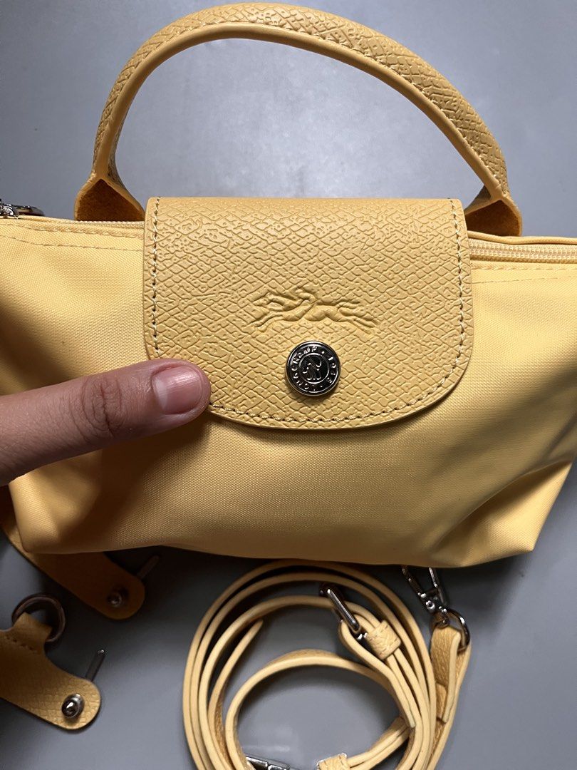 Micro sling longchamp (Category: Luxury Bags & Wallets) located in San Jacinto. Submitted by kellysthrift_ (Listing ID 1455105035, Image 1). Description: Lemon Micro Longchamp .