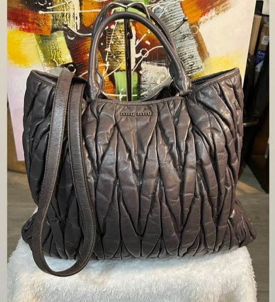 Miu Miu matelasse 2 way bag (Category: Luxury Bags & Wallets) located in Iloilo. Submitted by jananapad (Listing ID 1455021218, Image 1). Description: Well Used conditions GUARANTEED ORIGINAL 2way bag jm.